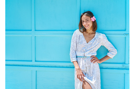 Charming young lady on bright blue, a Person Photo by vitaliymateha photography