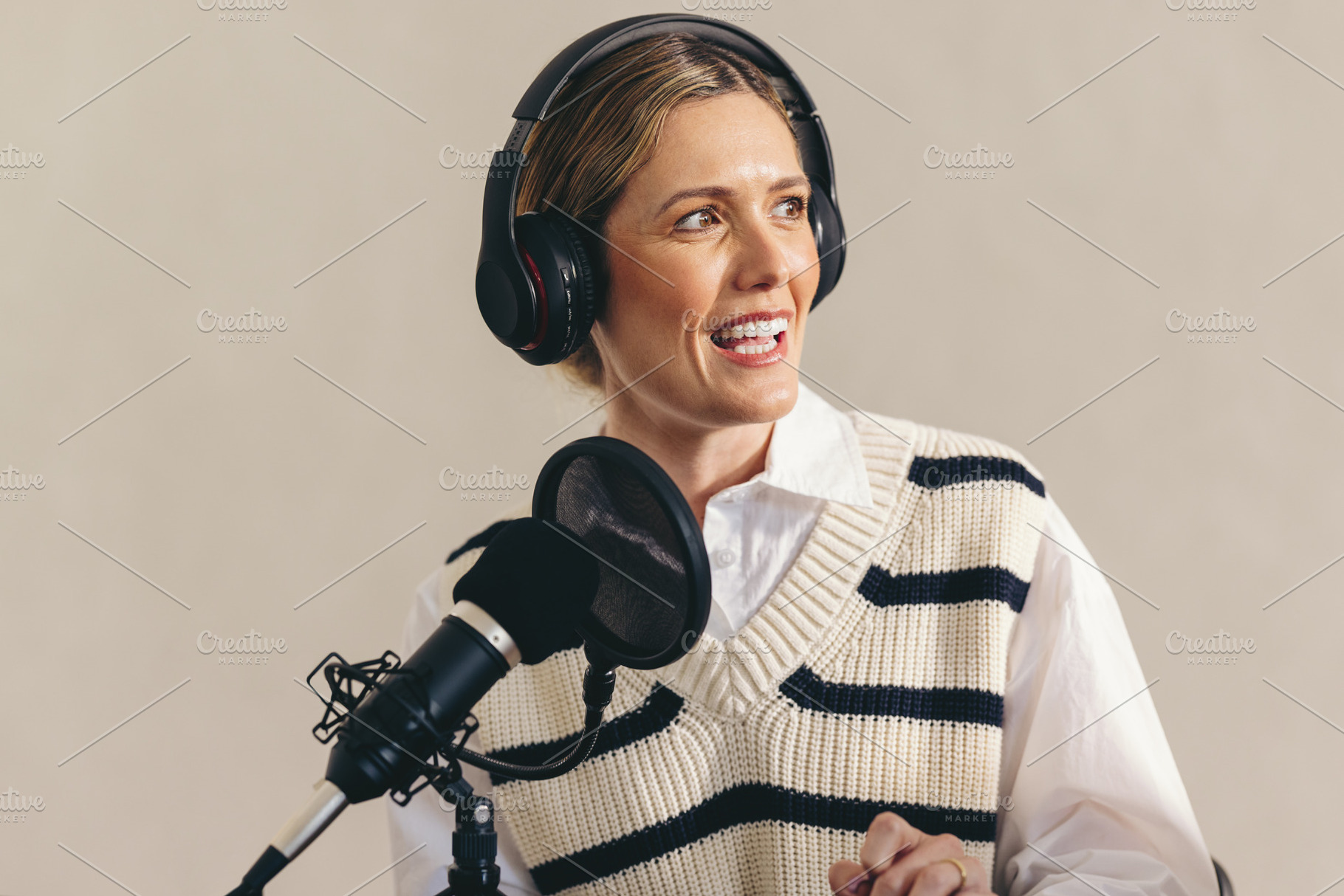 Woman hosting a radio show in a studio, a Person Photo by Jacob Lund