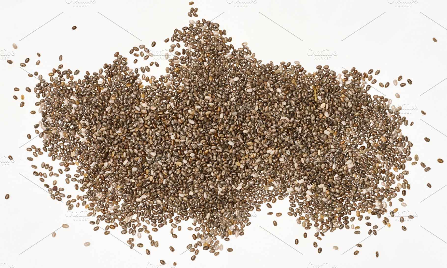 Scattered chia seeds on a white background, top view, a Food & Drink Photo by ndanko