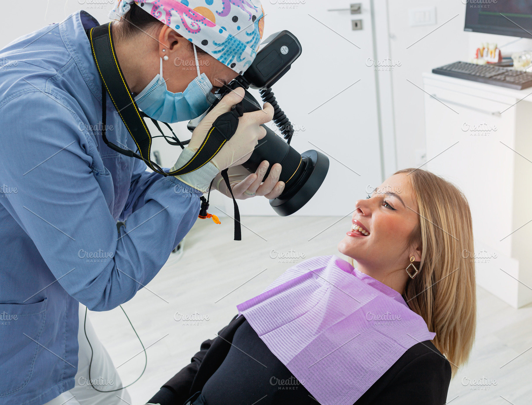 Dentist taking photos of patient's teeth in dental clinic, a Health & Medical Photo by Antonio Gravante Market