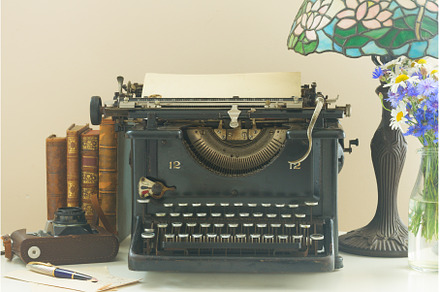typewriter on table, an Arts & Entertainment Photo by Neirfy