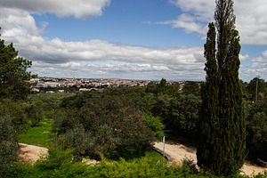 Panoramic view of Fatima, Portugal under a blue sky with surrounding nature, a Photo by AS photostudio