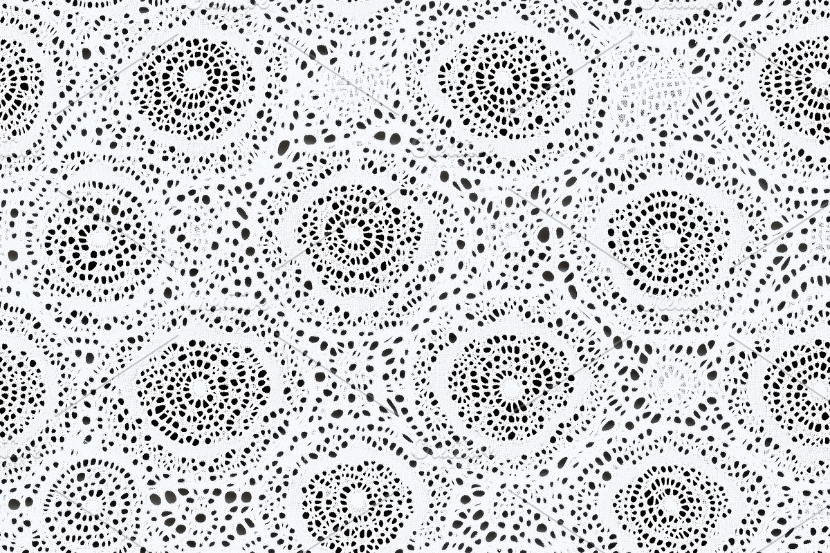 Seamless Malay lace pattern featuring abstract circular shapes in black on a li, a Texture Graphic by Textures & Backgrounds
