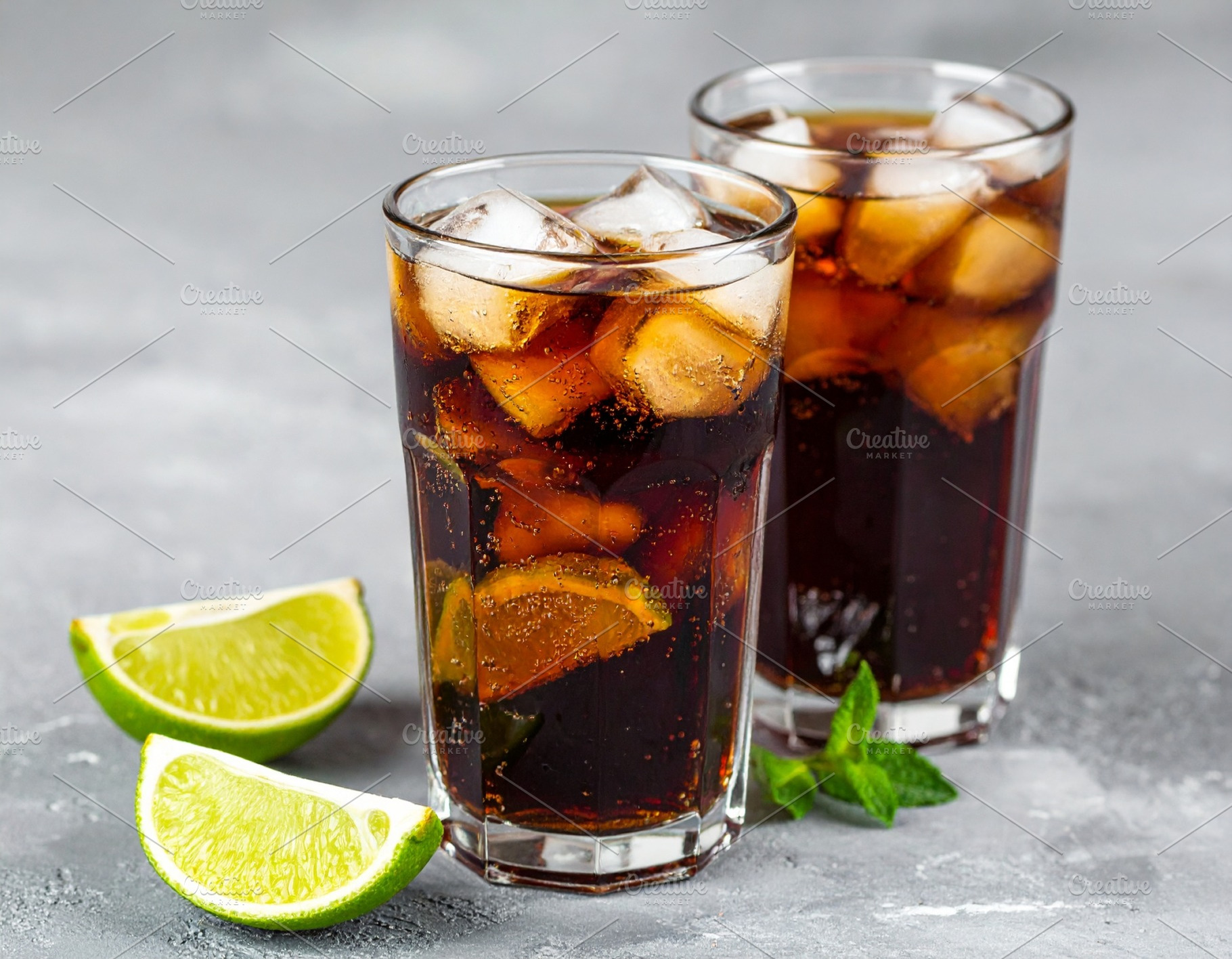 cola drink with ice and lime AI generated, a Photo by WorldOfPhotos