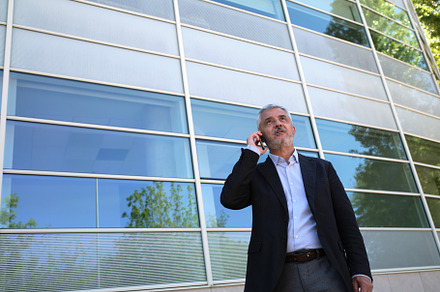 Mature businessman on the phone in t, a Person Photo by alfernec