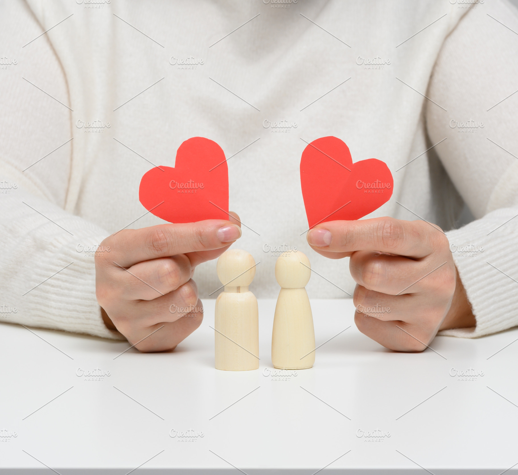 Pair of wooden men of the bride and groom, red heart, concept of, a Person Photo by ndanko