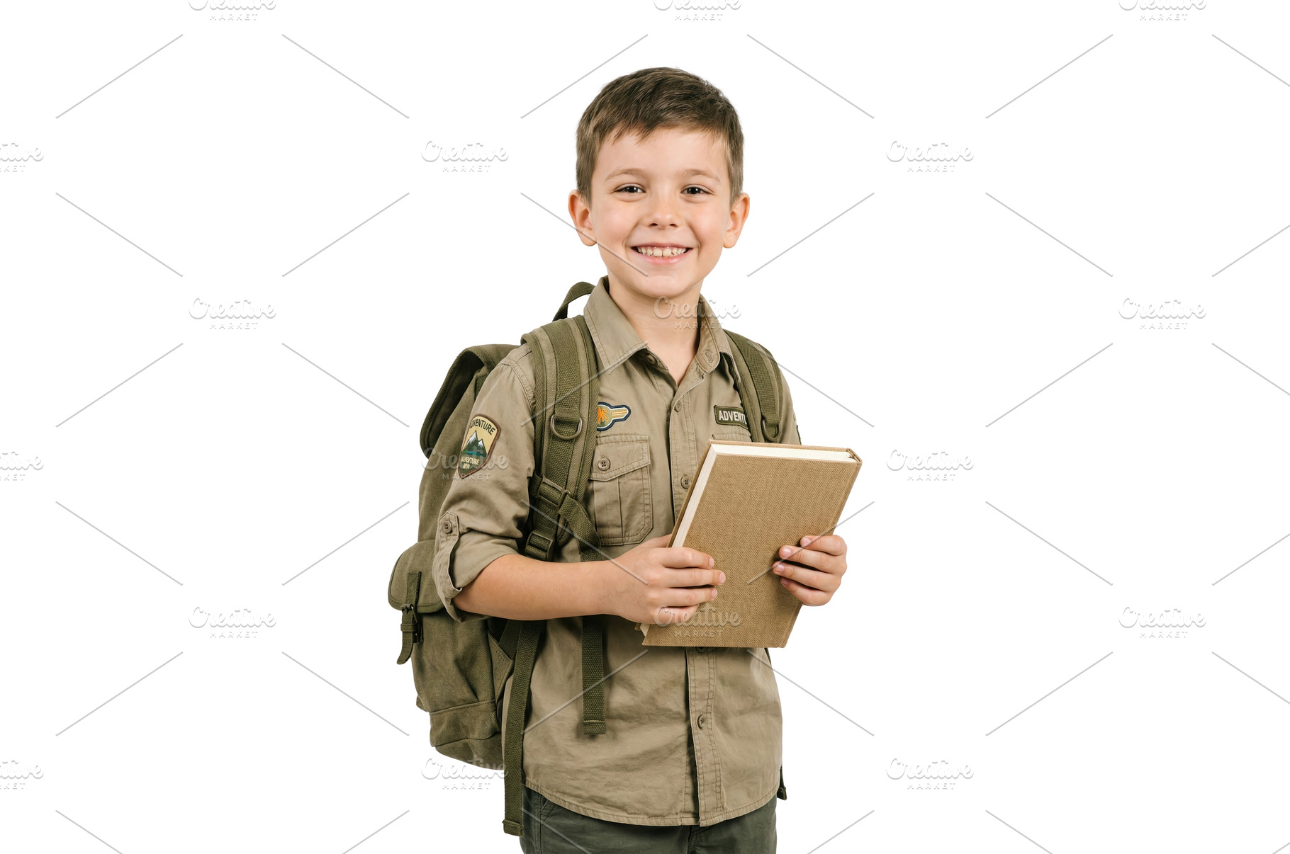 Smiling Boy With Book, a School & Education Photo by CREATIVEDEF