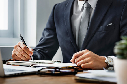Businessman working on a project, a Photo by rawpixel