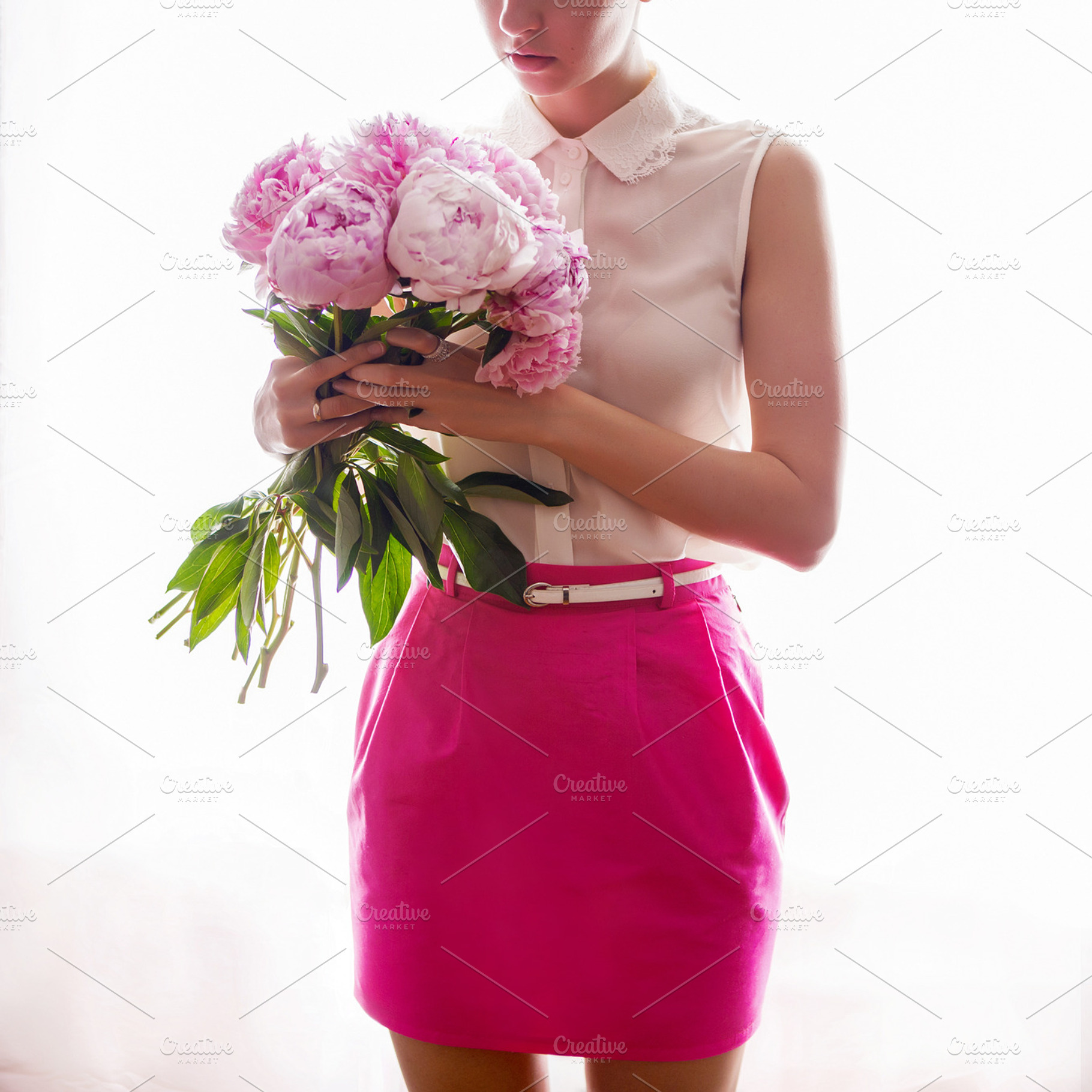 girl in pink skirt and white jacket in the hands holding a bouquet with peonies, a Holiday Photo by SaulichPhoto