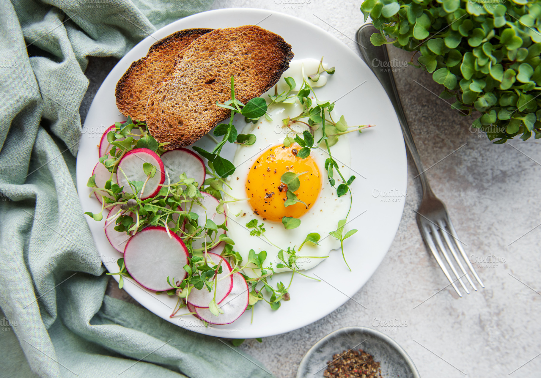 Rye bread  with fried egg, a Food & Drink Photo by Olena Rudo