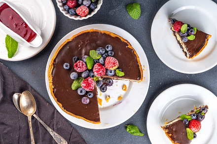 Homemade cheesecake with chocolate and berry, a Food & Drink Photo by Rimma