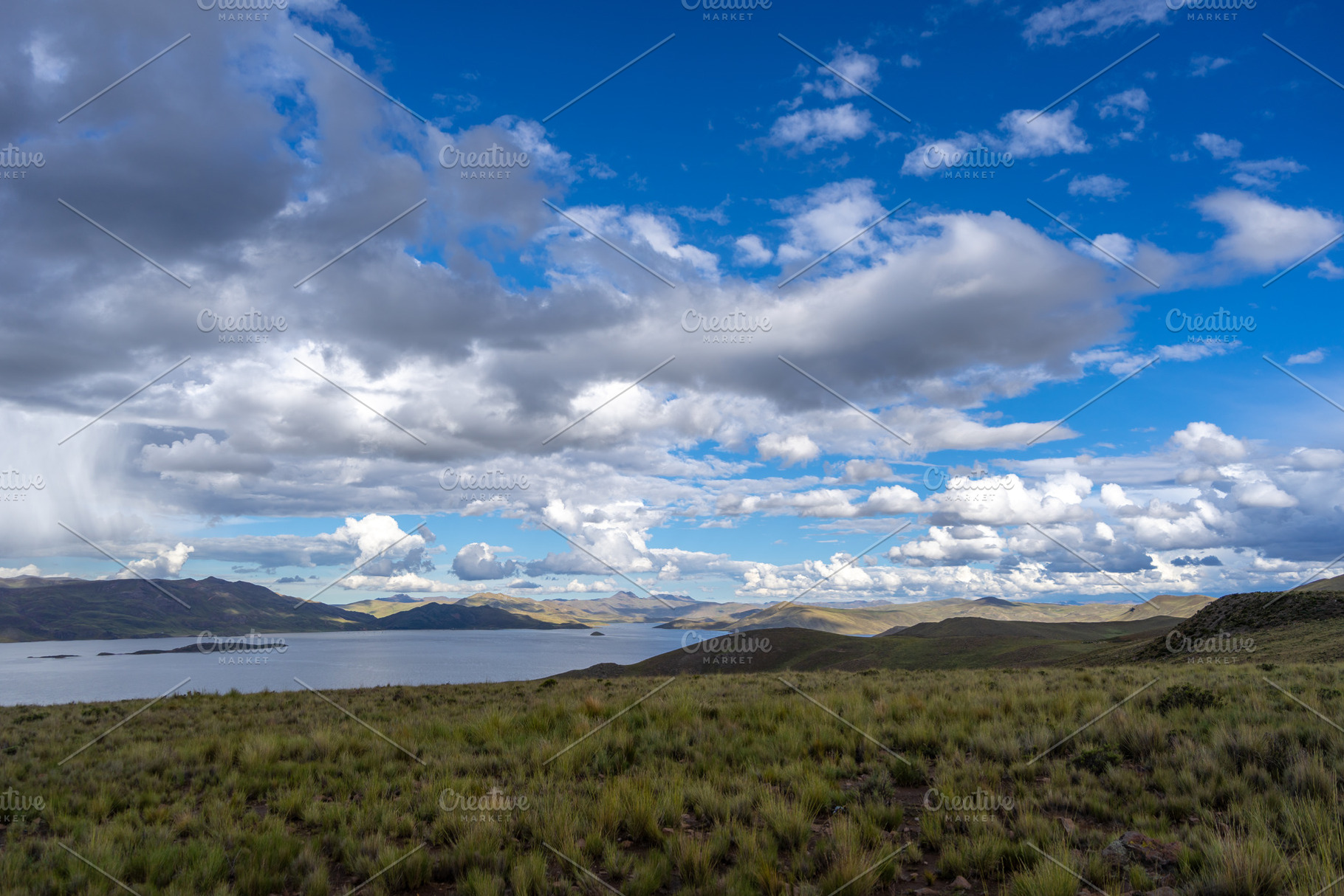 Storm clouds over Lake Lagunillas in the Peruvian highlands, a Nature Photo by GoodGoods