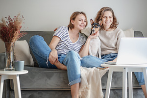 Happy lesbian couple at home