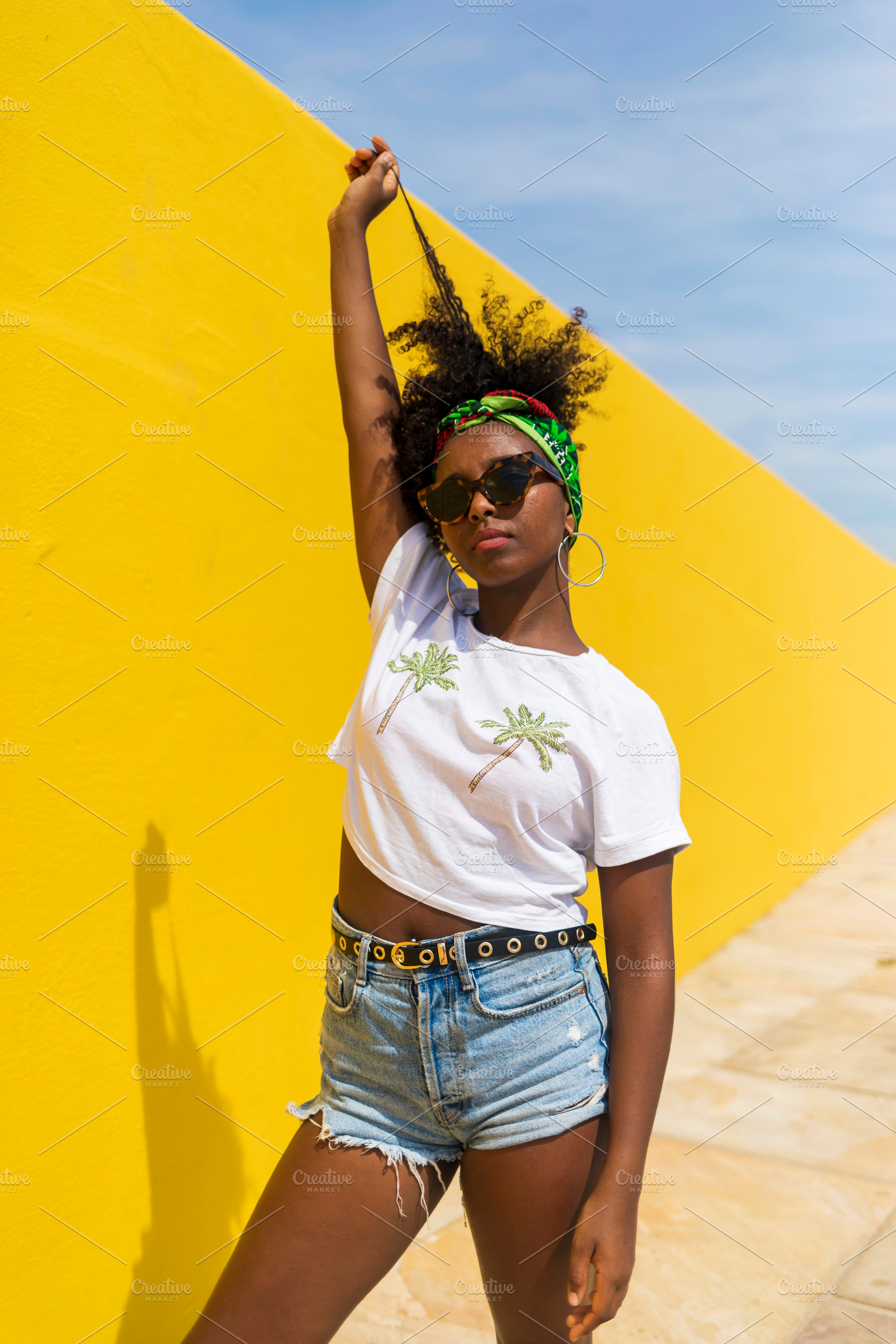 Young african woman with sunglasses featuring black, beautiful, and afro, a Person Photo by 2Design