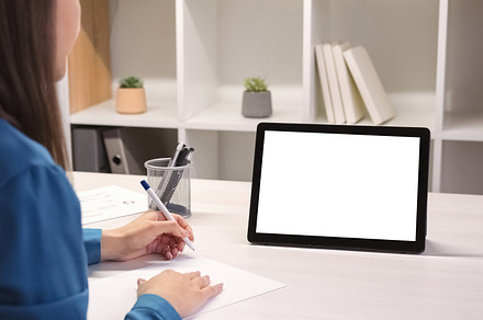 Video chat education home study woman tablet notes, a Technology Photo by Photo Drive Studio