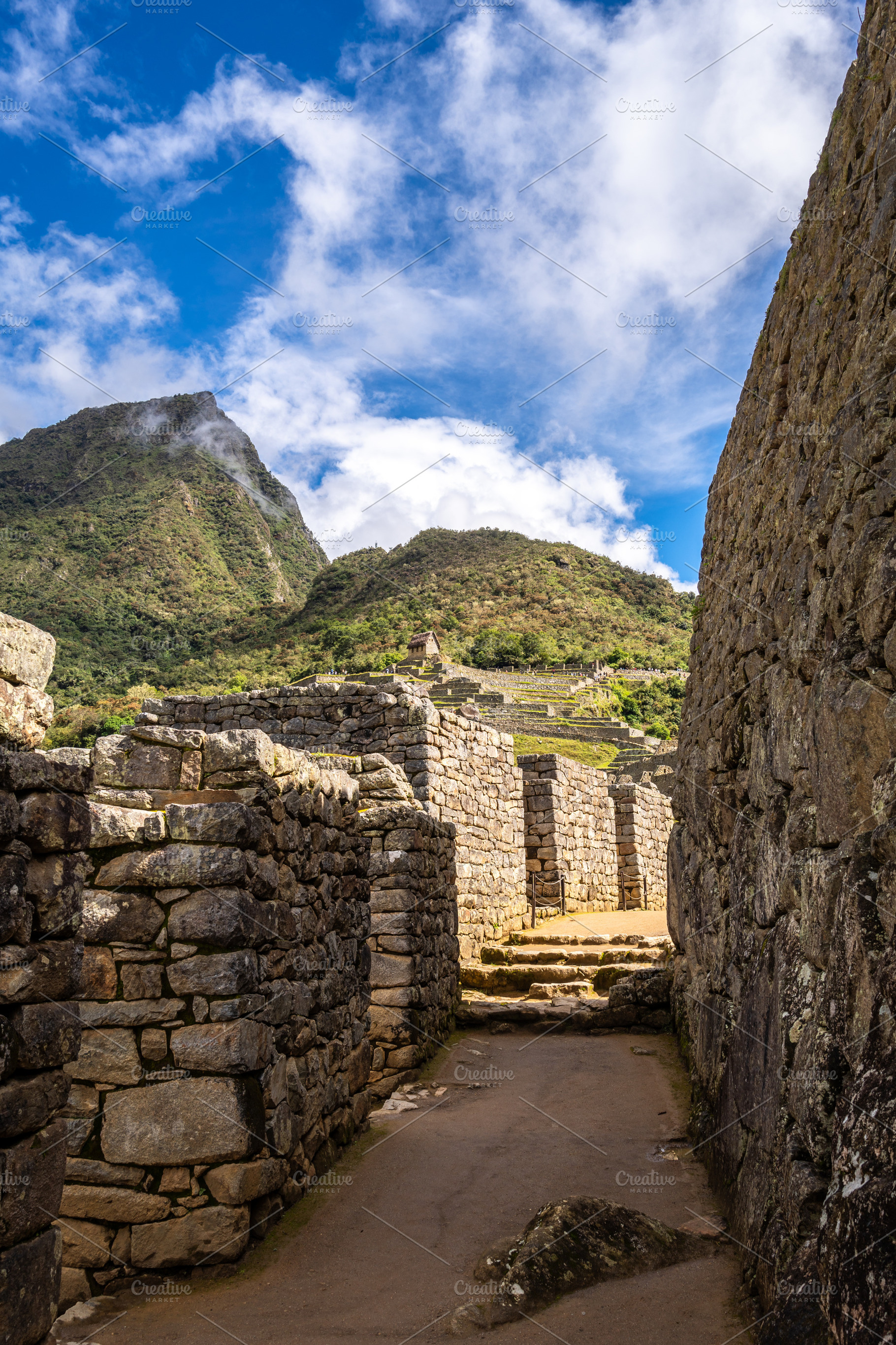 Ancient terraces and stone walls inside the Machu Picchu site in, an Architecture Photo by GoodGoods