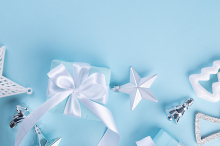 Christmas blue background. Holidays gift box wrapped in blue pap, a Holiday Photo by vimart
