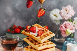 Levitating waffles with strawberries