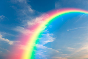 Rainbow and sunset sky background