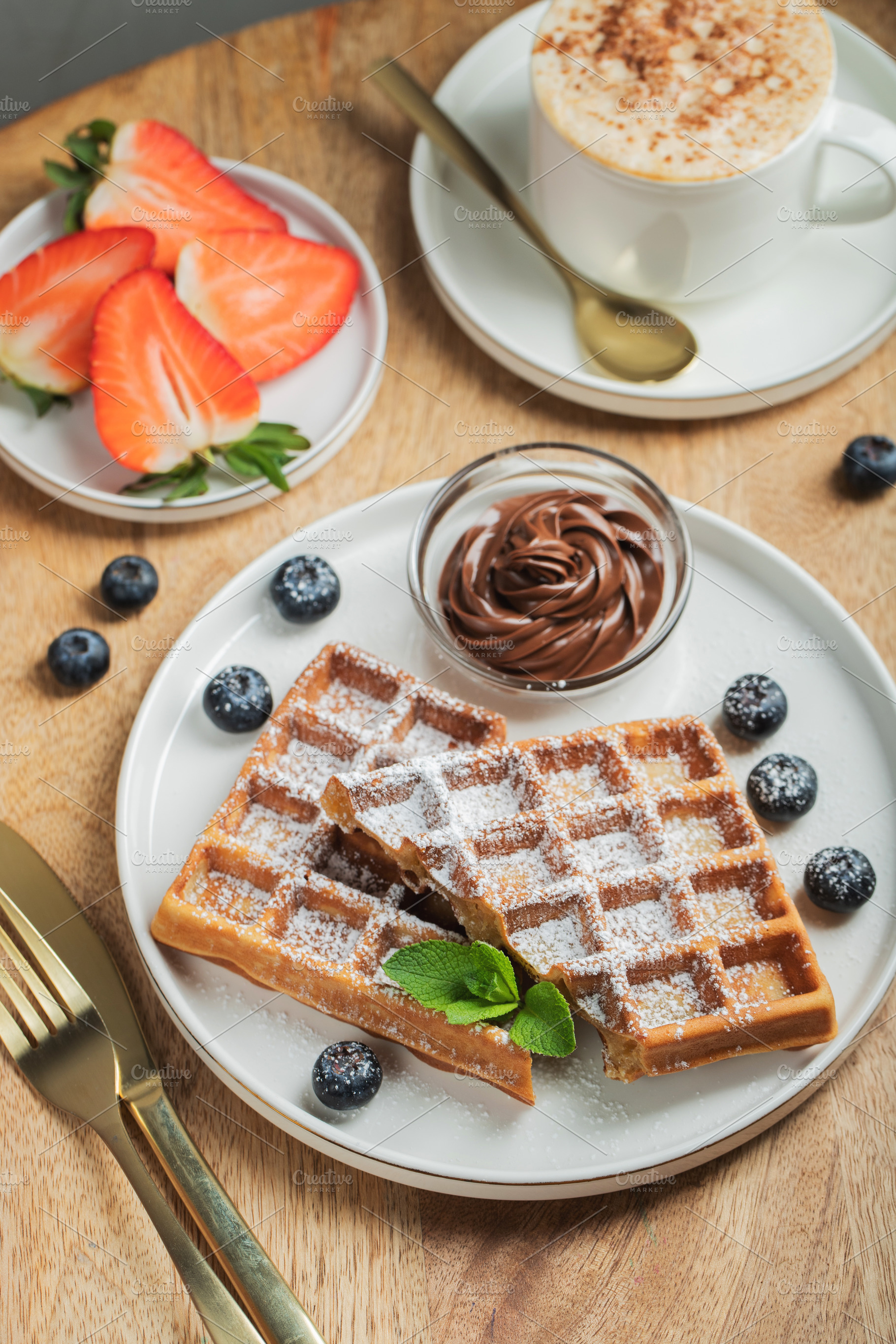 Belgium waffles Homemade waffles with strawberries, a Food & Drink Photo by Budarinphoto