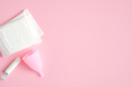 Menstrual hygiene products top view containing menstrual, cup, and tampon, a Health & Medical Photo by photoguns