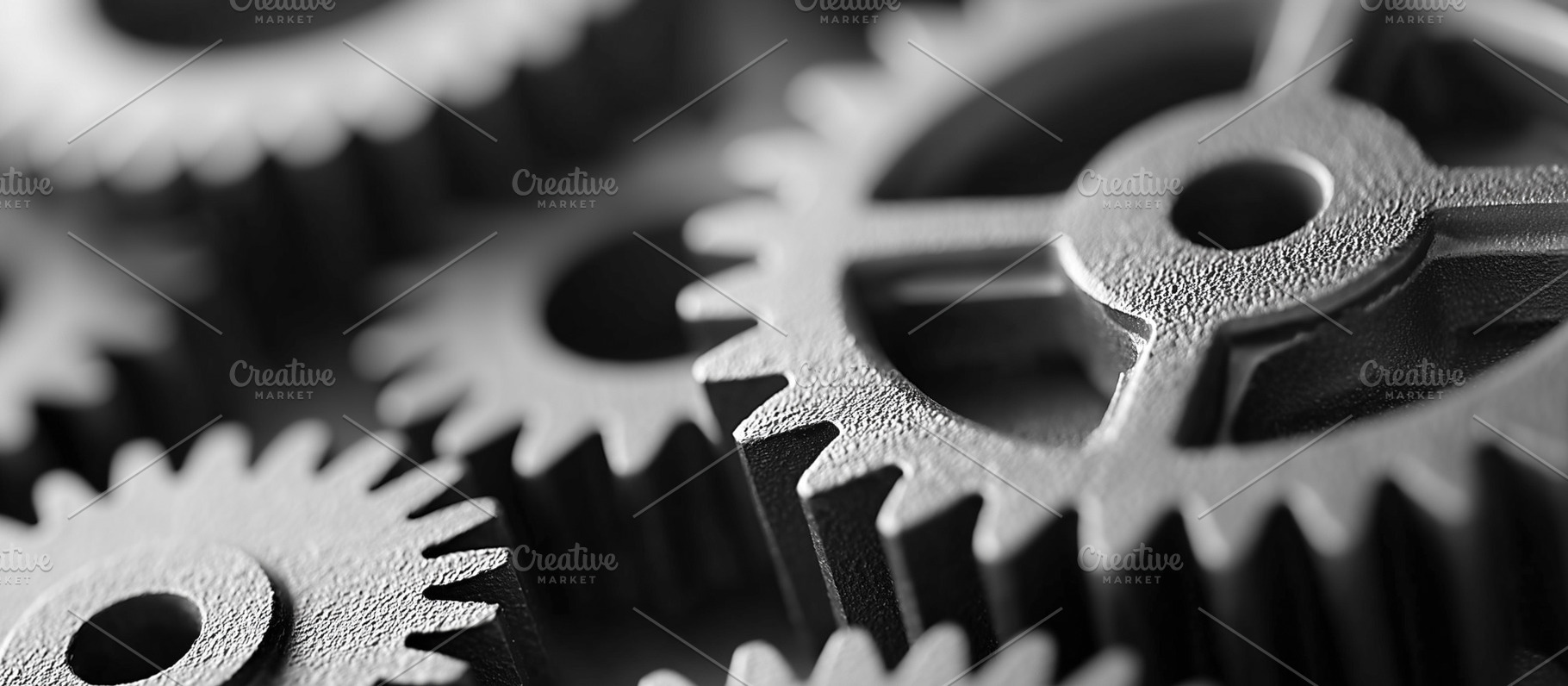 Close up of interlocking gears, an Industrial Photo by MistyDay
