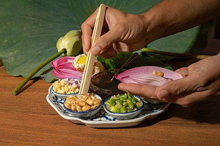 A set of Miang kham, Thai appetizer food with Lotus flower and l, a Background Photo by Tampatra