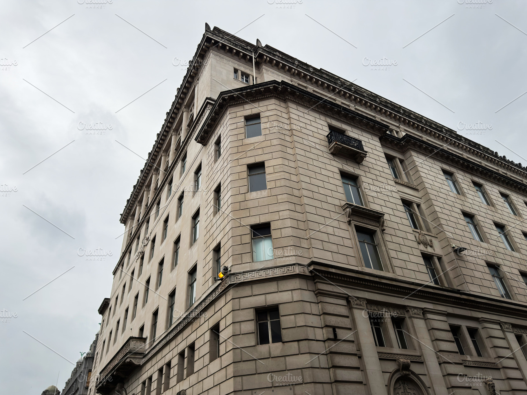 Historic stone office building corner with classical Beaux Arts, a Photo by AS photostudio