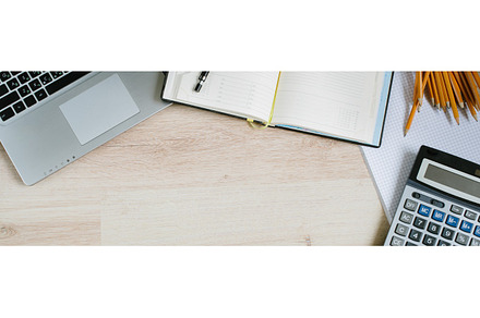 Office desk table with computer supplies and calculator top view with copy, a Business Photo by ok_kate