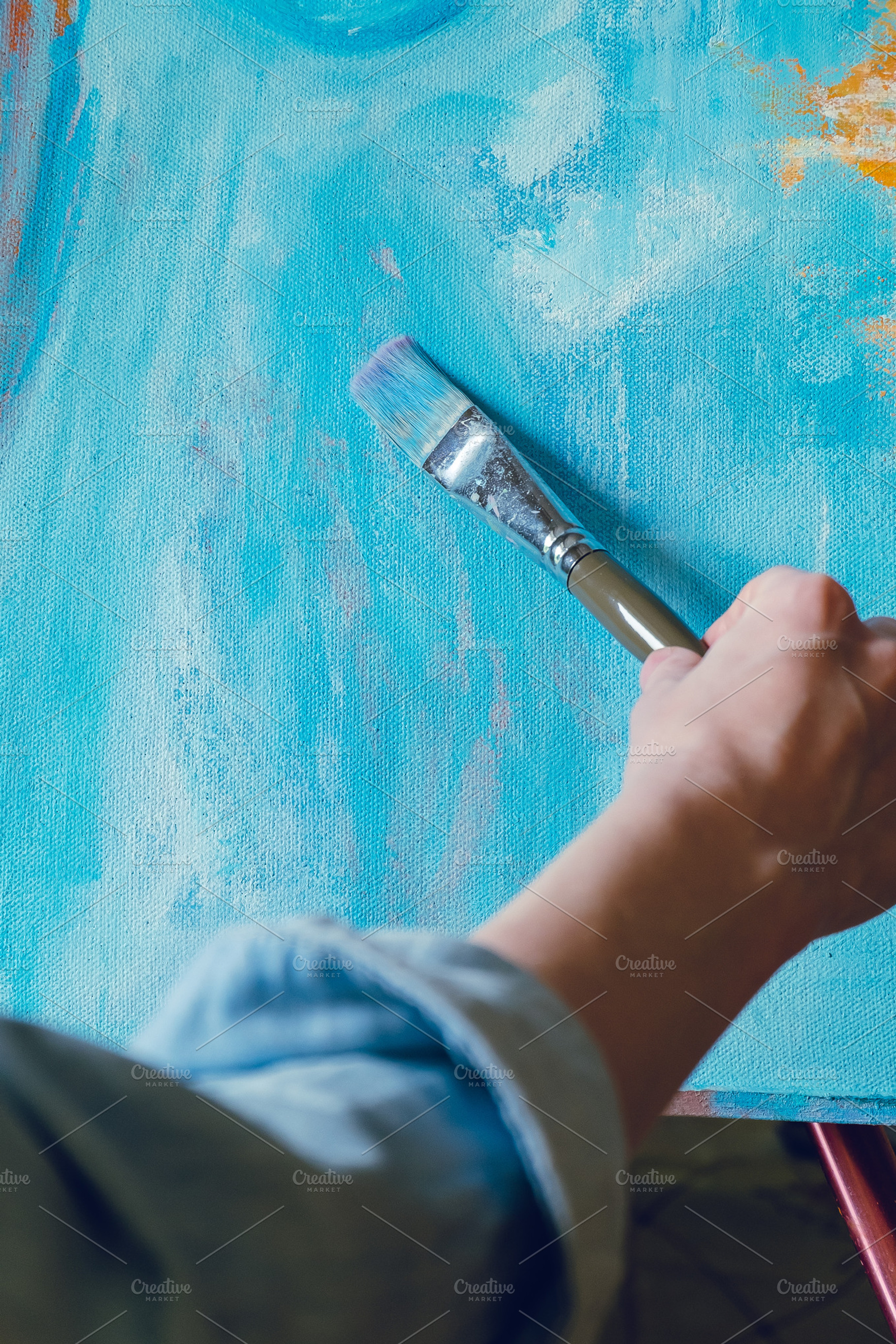 Hand of artist with paintbrush, an Arts & Entertainment Photo by Valeryia P.