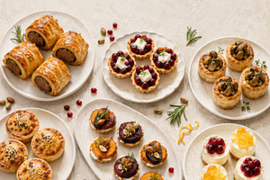 Assorted holiday pastries on white p, a Photo by Dvoevnore photos