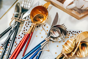 Colorful cutlery sets with wooden, a Photo by Dvoevnore photos