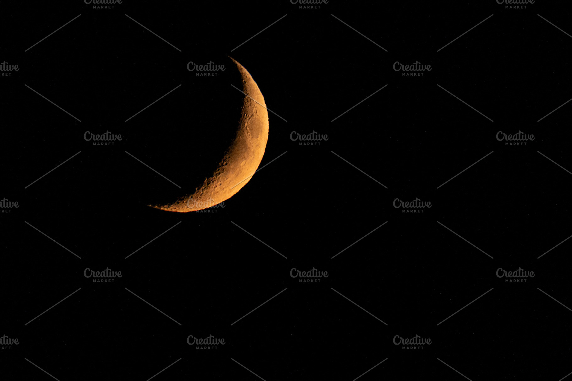 Yellow crescent moon in the dark, a Nature Photo by PhotoNature