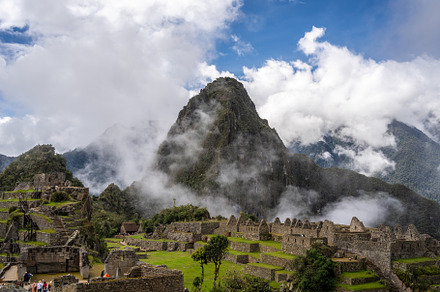 Panoramic view of Machu Picchu ruins with Huayna Picchu in backg