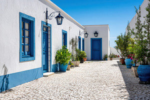 Coastal village alleyway, a Photo by Beautiful things