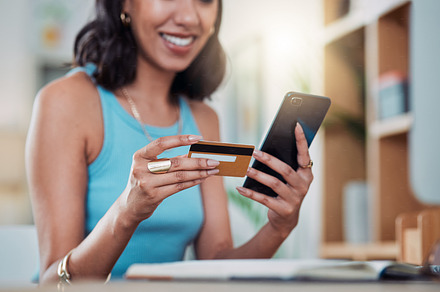 Online shopping, phone banking and credit card for investing, ordering or purchasing distance learning home course. Freelance entrepreneur hands trading, buying and paying for ecommerce startup order, a Photo by Peopleimages.com