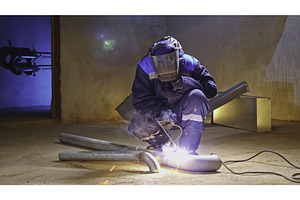 Man with welding at construction, an Industrial Photo by Media Whale Stock