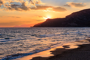 Sunset on sea beach, a Nature Photo by YuriyB