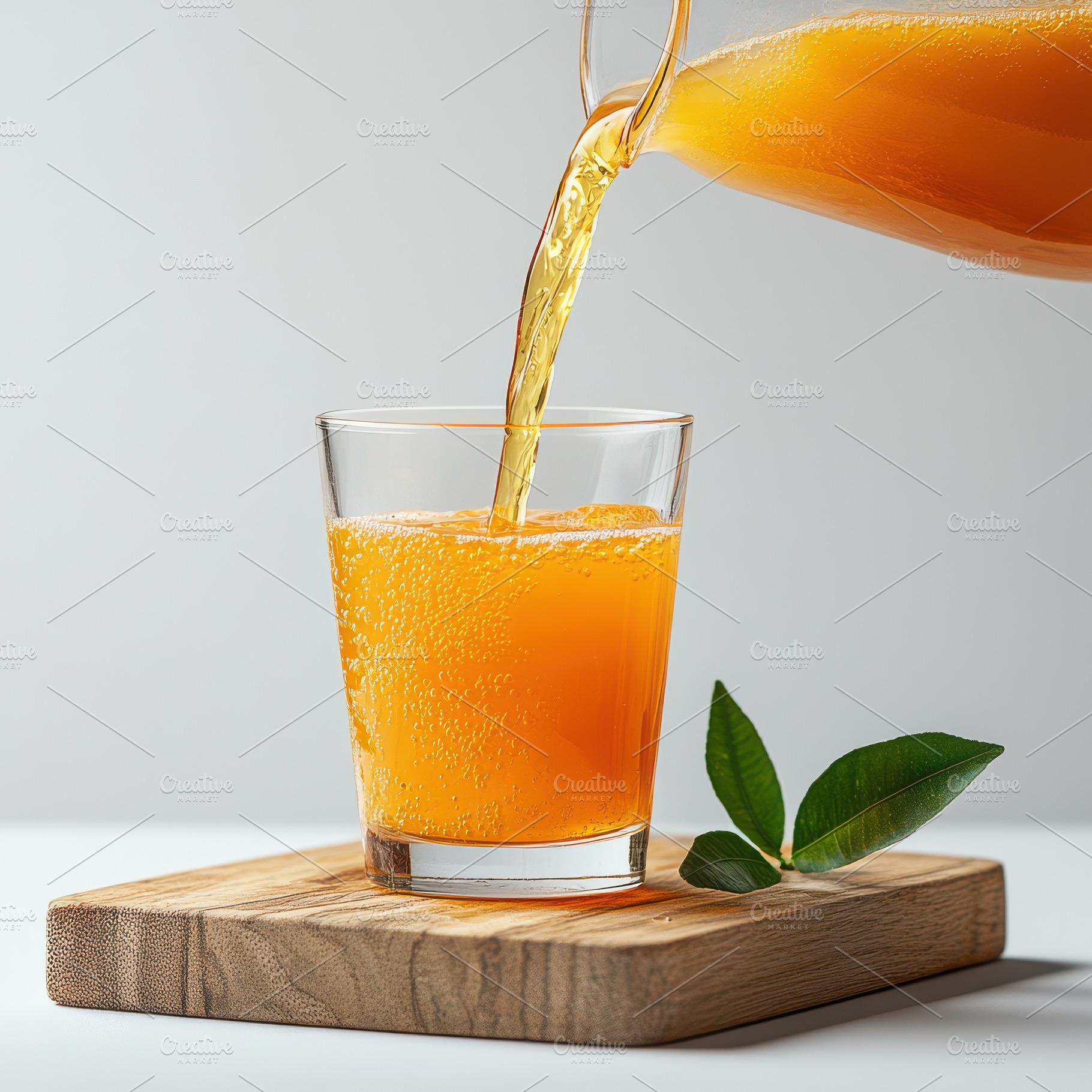 Refreshing Orange Juice Pouring into, a Food & Drink Photo by Pixeness Studio