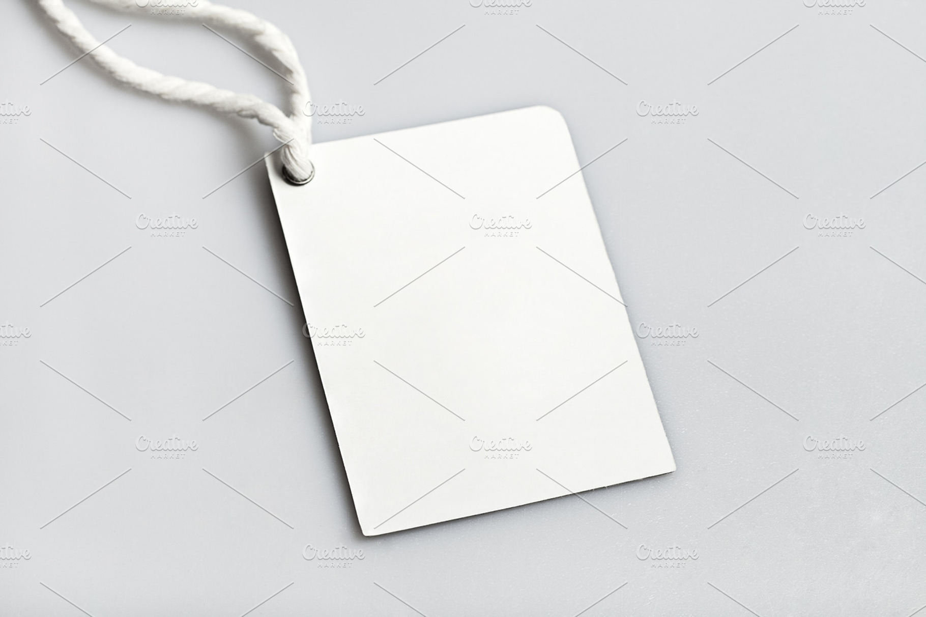 Cloth label blank tag containing background, blank, and closeup, a Business Photo by Olha Klein