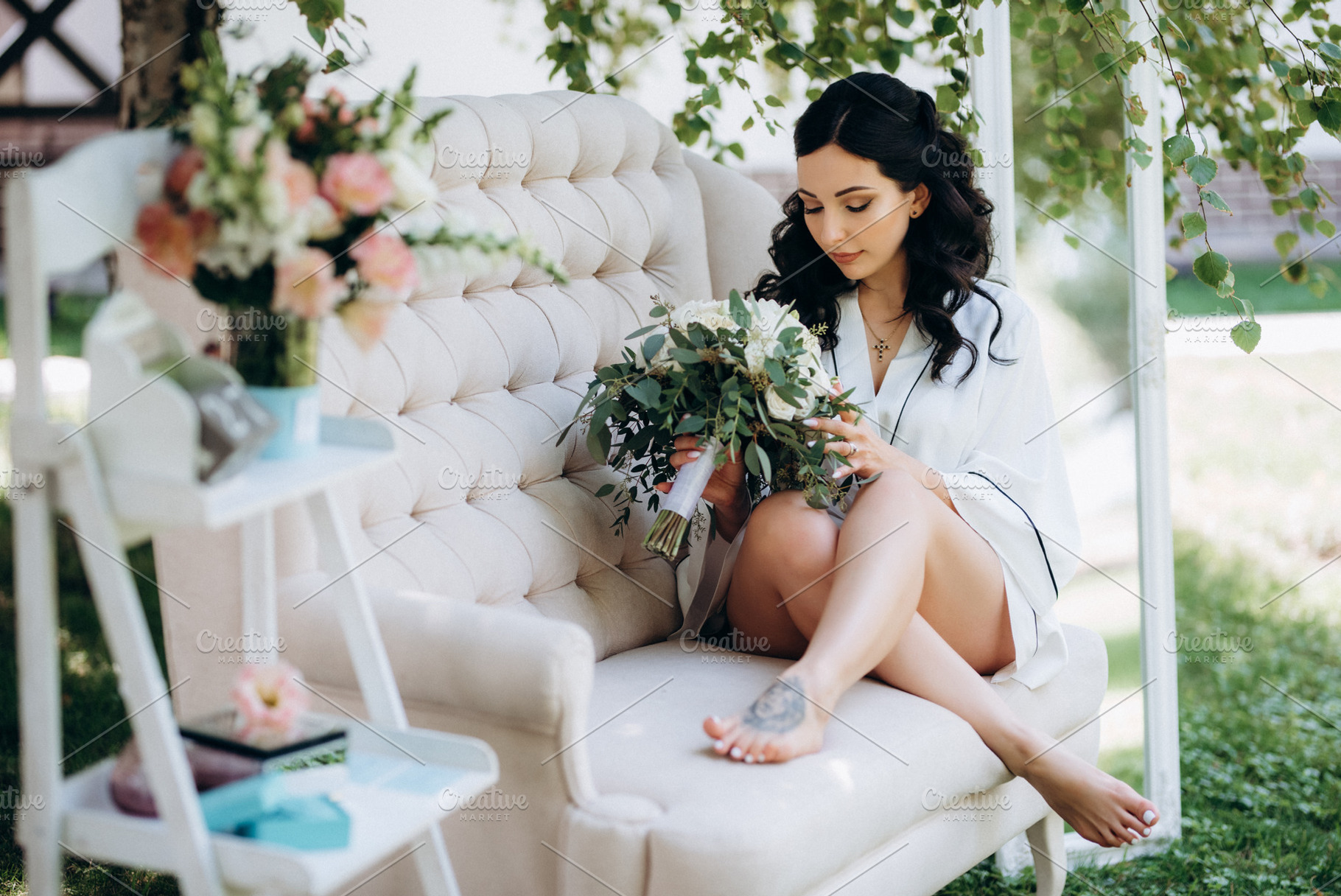 black-haired bride prepares for her wedding in a boudoir, a Person Photo by Weddings, People, Travel