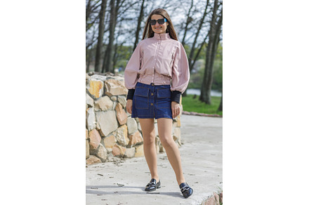 Young woman in pink jacket and denim, a Person Photo by serkum