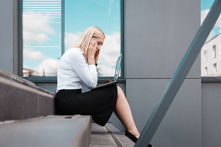Tired office worker is sitting, a Photo by borodai94