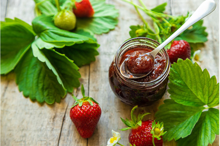Homemade strawberry jam in a jar, a Food & Drink Photo by yanadjana