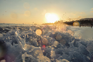 Ocean waves at sunset stock photo containing waves and beach