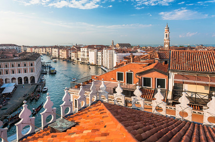 Blue sky over yellow roofs of Venice