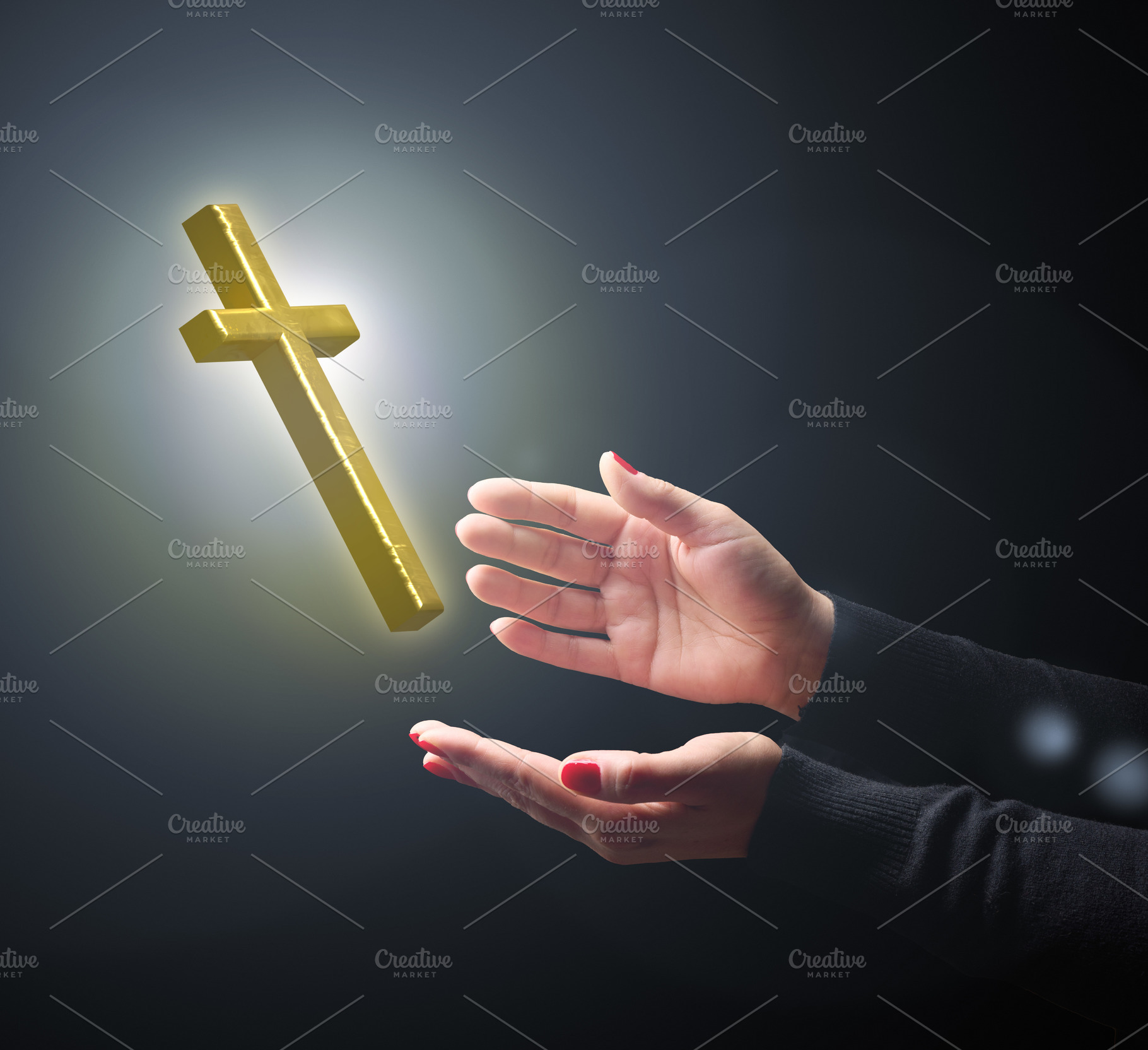 Women's hands reach out to a shining golden cross on a dark back, a Person Photo by ndanko