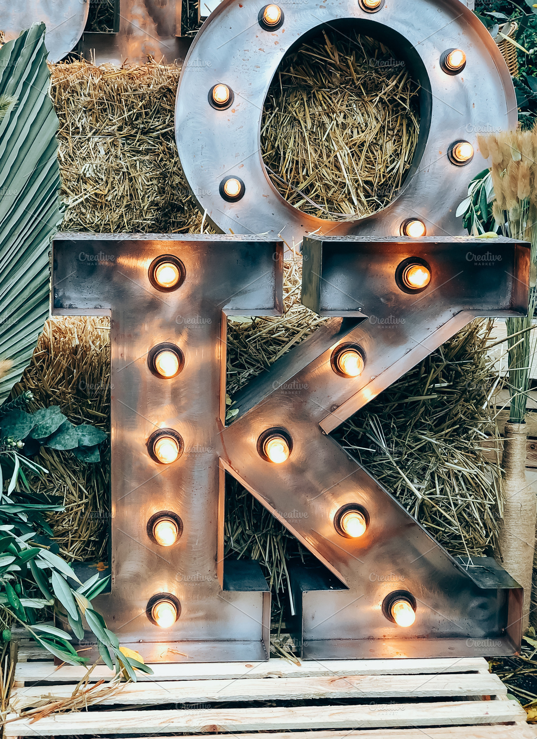 Illuminated metal letter K against a, a Photo by Dvoevnore photos