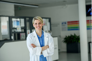 Young female doctor with short hair, a Person Photo by HalfPoint