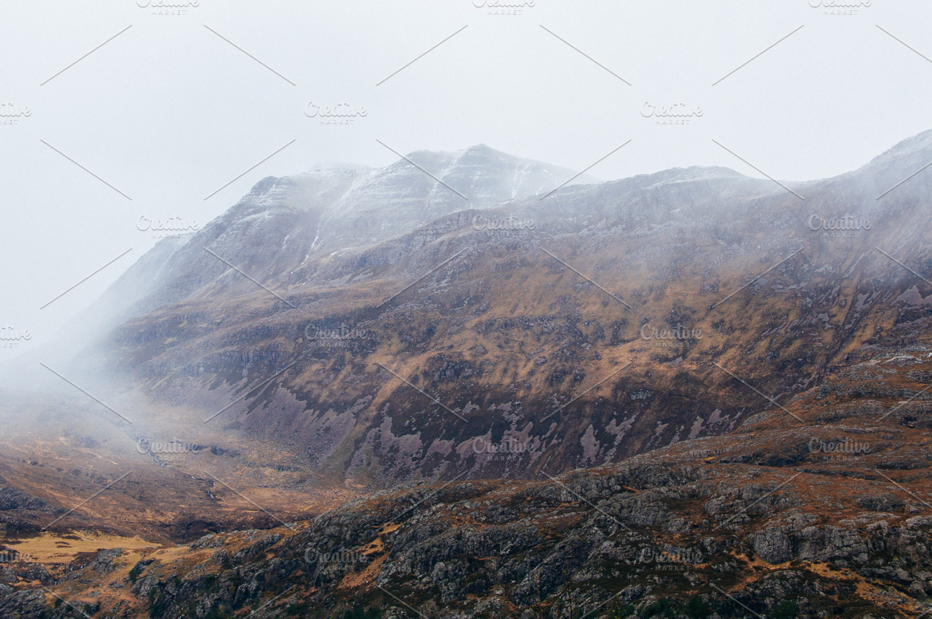 Foggy Mountain Range In Autumn